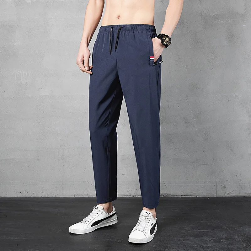 Spring and Autumn Men\'s Elastic Belt High Waist Solid Color Drawstring Panel Contrast Pocket Harun Nine Point Trousers Pants
