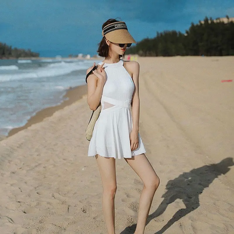 2023 New Fashionable Beach Women's Bathing Temperament Backless Swimwear Sexy High Waited One Piece the Bell Solid Halter Bikini