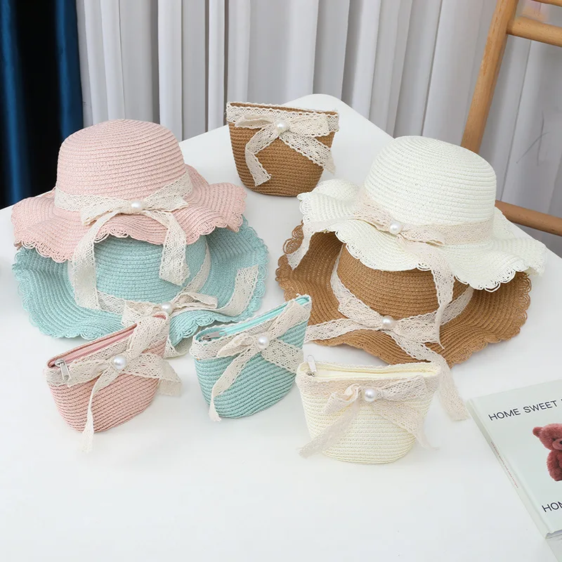 Vendita calda ragazze paglia turismo fiore bambini cappello da sole e borsa set bambino all'aperto largo tesa secchiello cappelli per bambini_voghion.com