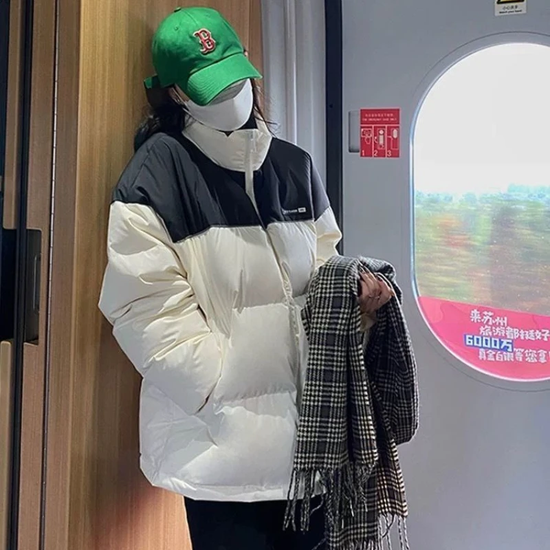 2023 Winter New Down Coat Women's Short Korean Edition Thickened Student Couple Loose Spliced White Duck Down Coat Trend