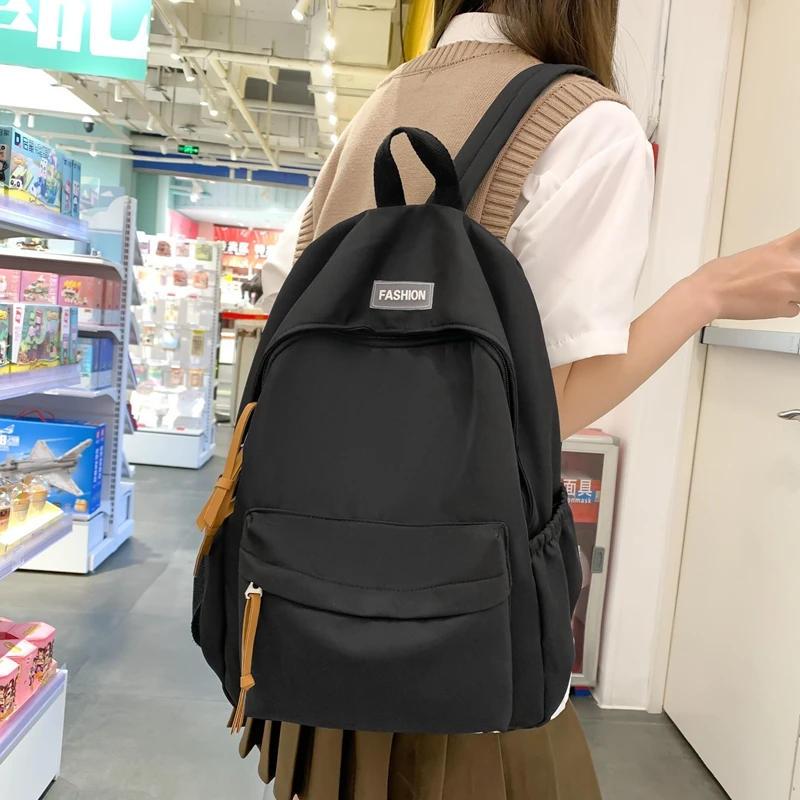 2023 New Backpack Womens Bag Version Versatile Canvas Book Bag Leisure  Simple Travel Bag Fashion One Shoulder Backpack 50% Clearance Sale From  Necklace_co, $26.87