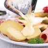 Swissmar KF-77040 Classic 8-Person Raclette with Reversible Cast Iron Grill Plate/Crepe Top, Black 2