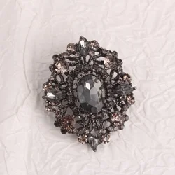 Elegant Vintage - Style Brooch with Dark Crystals and Ornate Hollow Design (A0 - 3 - 5832)