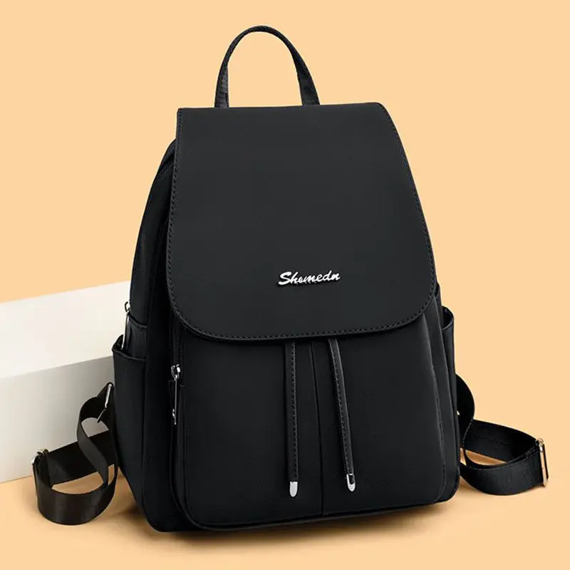 Lightweight and durable women's backpack, designed for both shoulder and travel use, made of Oxford fabric to accompany you on y