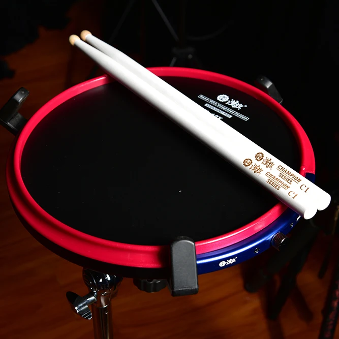HUNSnareMarchingDrumPadswithlaminatedinsertedpads.jpg