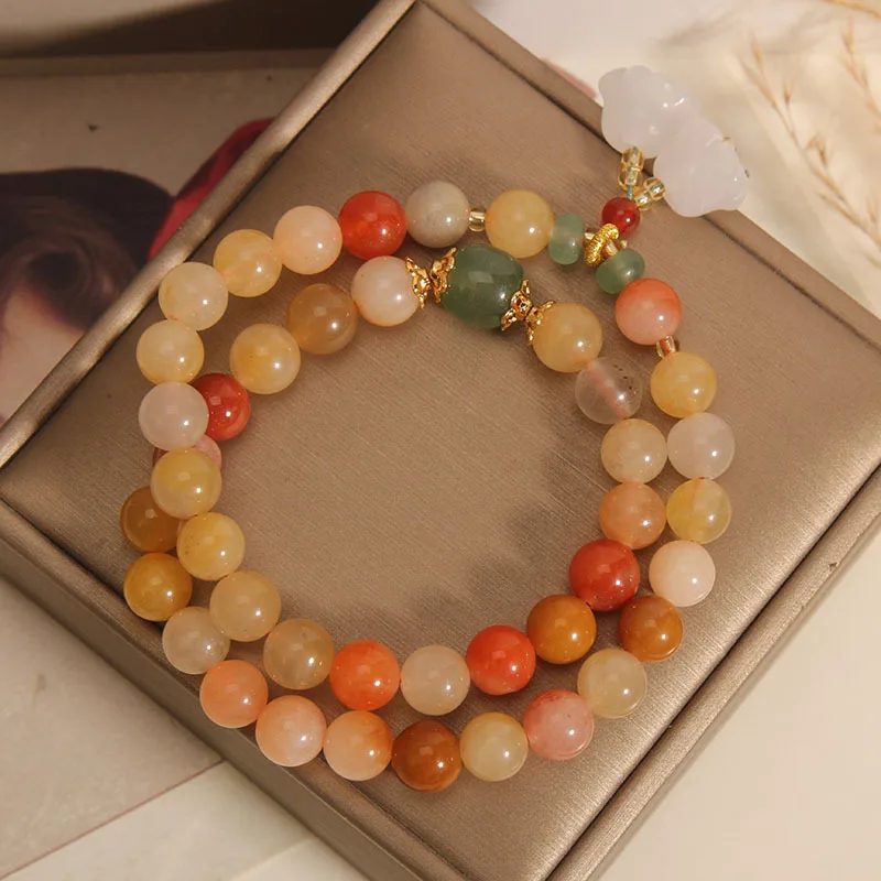 Jade charm bracelet with gentle pastel gemstones