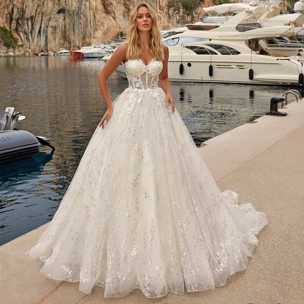 

Luxury Ball Gown Tulle Wedding Dresses for Brides Sexy Sweetheart Sleeveless Bridal Gowns Lace Up Back Court Train Custom Made