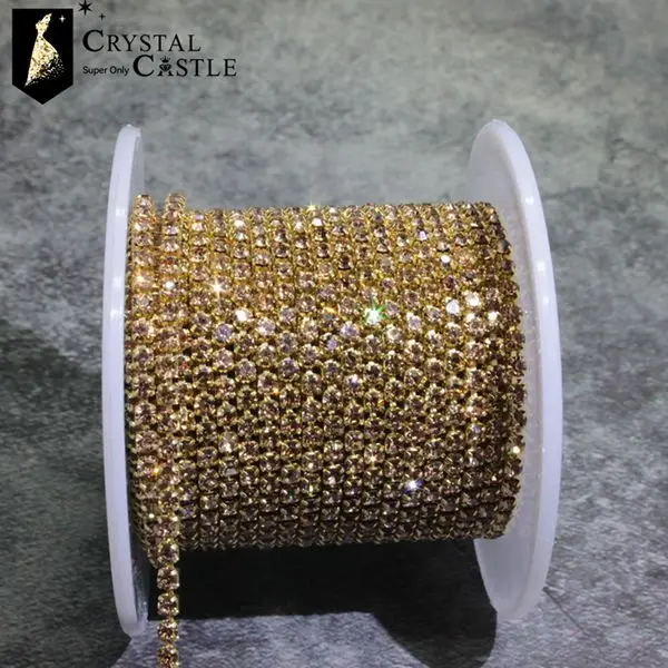 Gold Rhinestone Tassel Chain Roll with Crystal Ribbon Trim