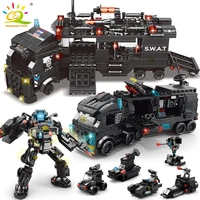HUIQIBAO 454-585PCS 8in1 SWAT Police Command Truck Building Blocks City Helicopter Bricks Kit Educational Toys for Children 1