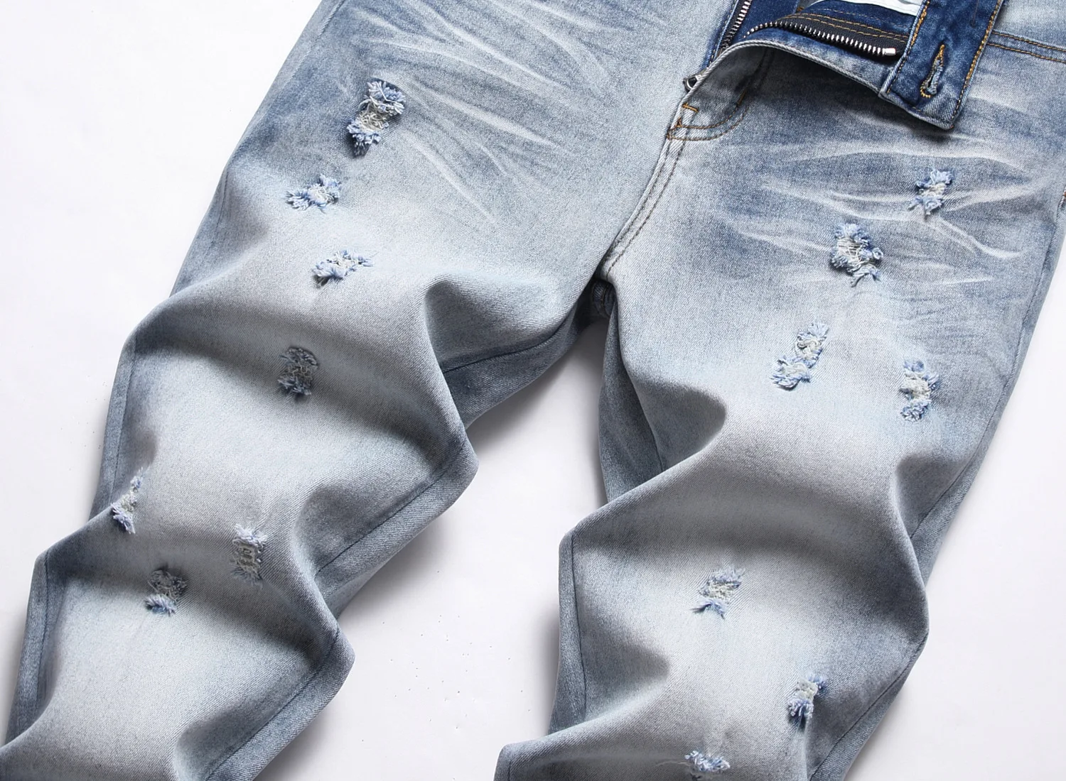 Europe and the United States new autumn  winter ripped jeans men AM men's elastic slim feet fashion br long pants