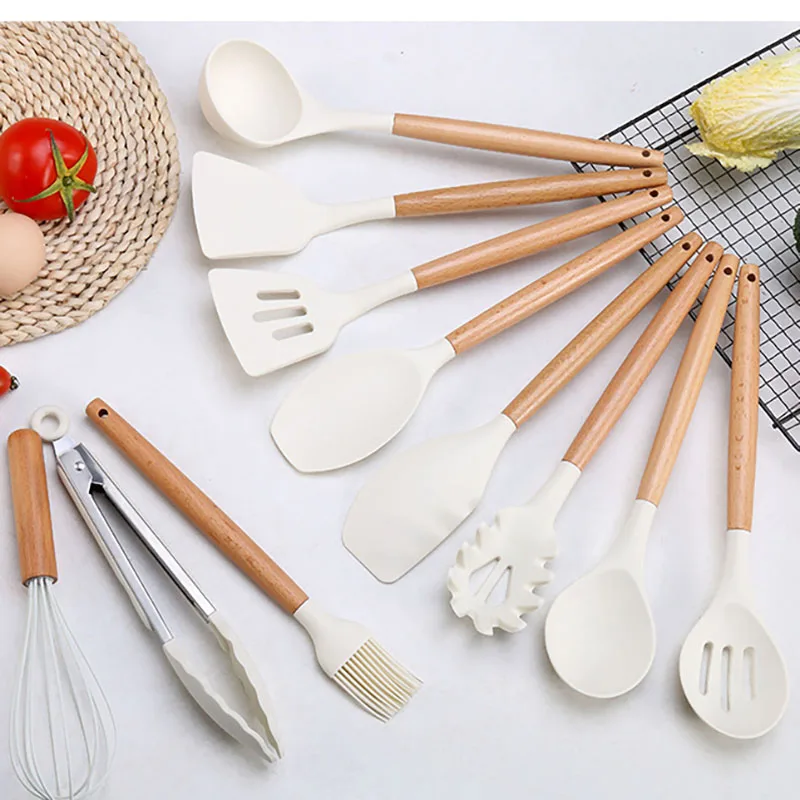 https://ae01.alicdn.com/kf/S29f5009ca6ae494a8e3b62d05b8069d5B/White-Silicone-Kitchenware-Non-Stick-Cookware-Kitchen-Utensils-Set-Spatula-Shovel-Egg-Beaters-Wooden-Handle-Cooking.jpg