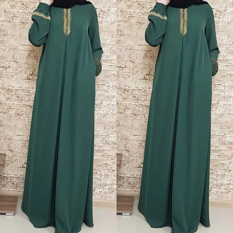 A women's long sleeve casual abaya with elegant embroidery. The abaya features intricate floral patterns and is designed for comfortable, everyday wear. 