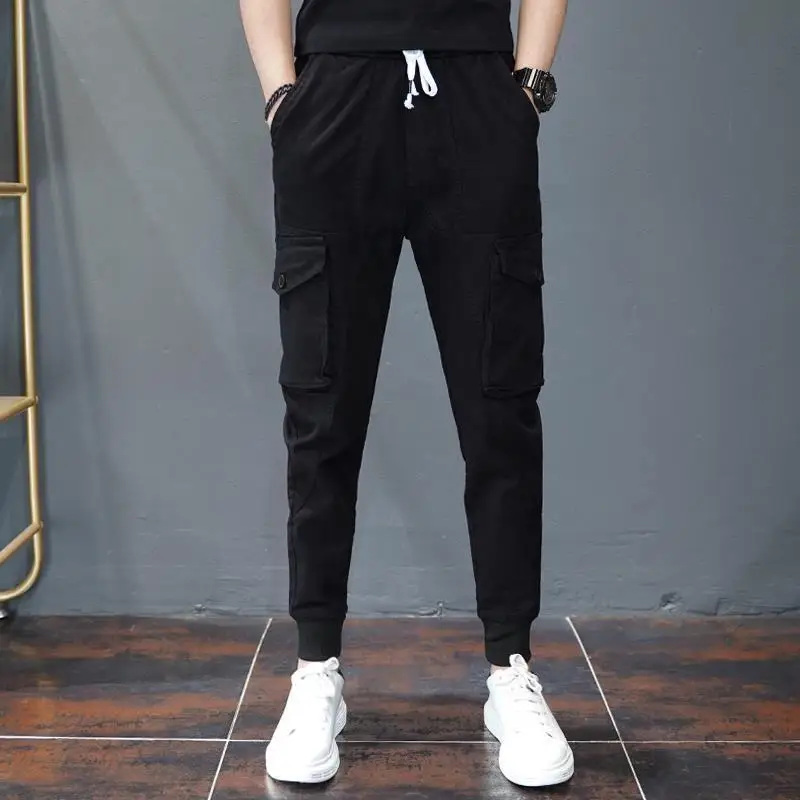Spring Autumn New Solid Color Fashion Elastic Waist Cargo Pants Man High Street Pure Cotton Pocket Patchwork Drawstring Trousers
