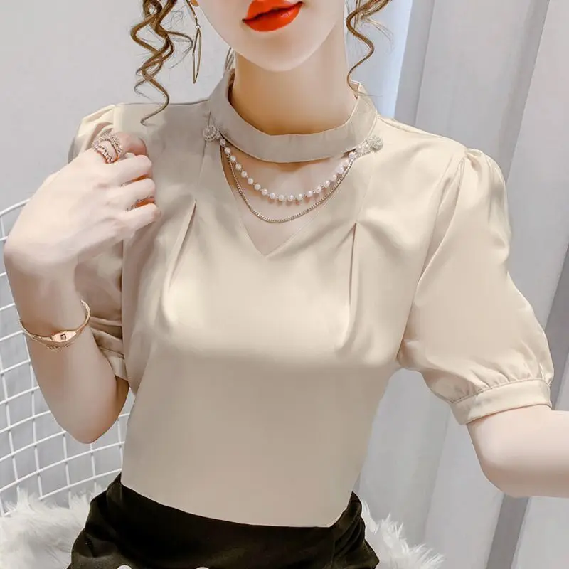 

Summer New Round Neck Fashion Short Sleeve Blouse Women Elegant Solid Color Button Hollow Out Pullovers Casual All-match Tops