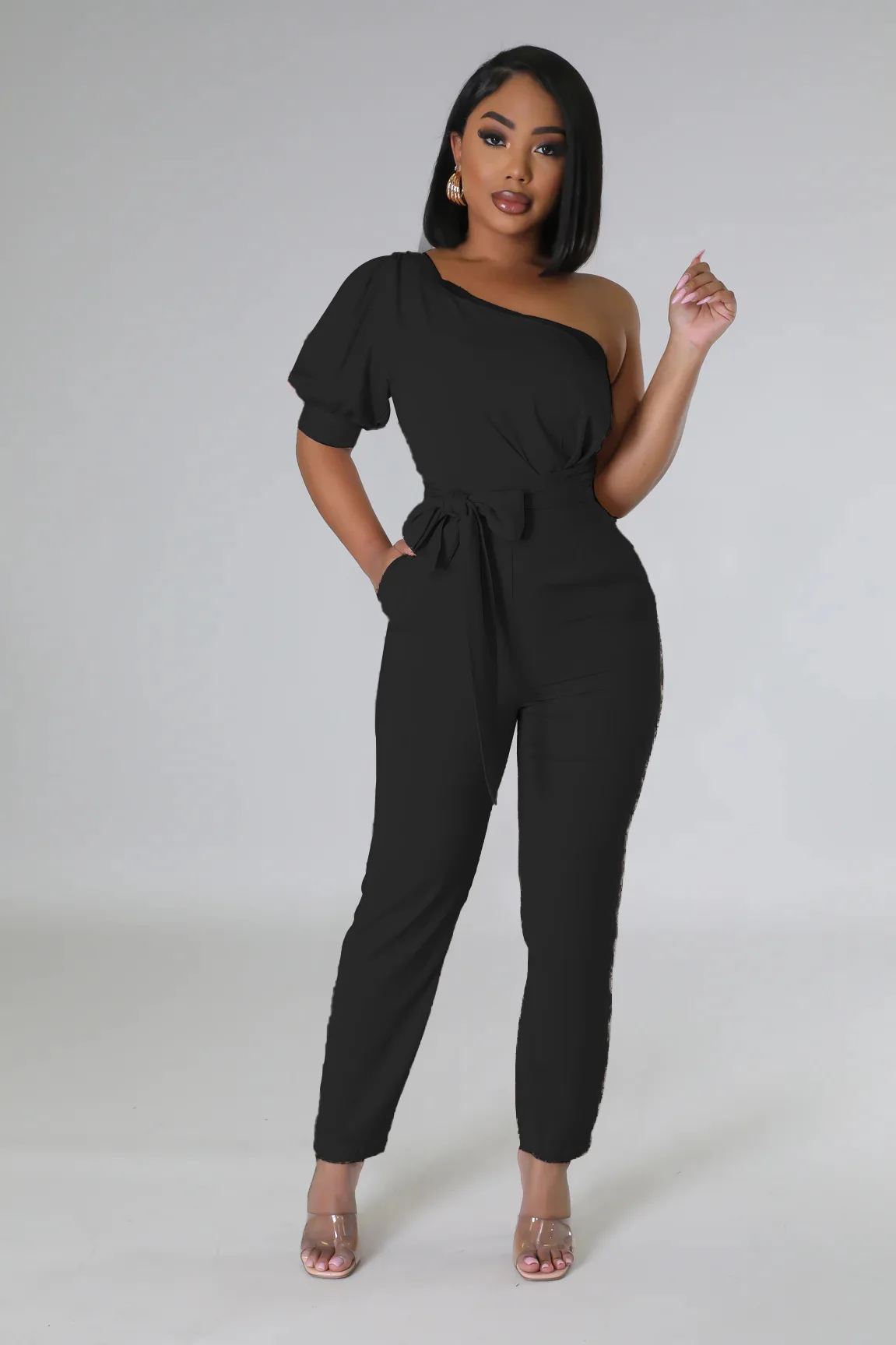 

2023 Summer Solid Colours Fashion Streetwear Playsuit Women Elegant One Shoulder Skew Neck Sashes Waist Short Sleeve Jumpsuit