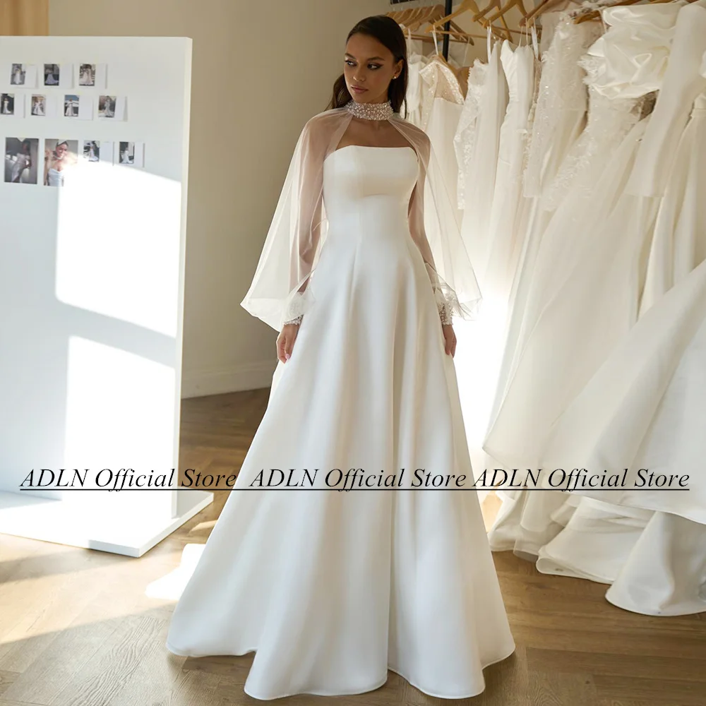 

A Line Wedding Dress with Detachable Puff Tulle Sleeves Beading Sequined Strapless Sweep Train Satin Bridal Gown for Bride