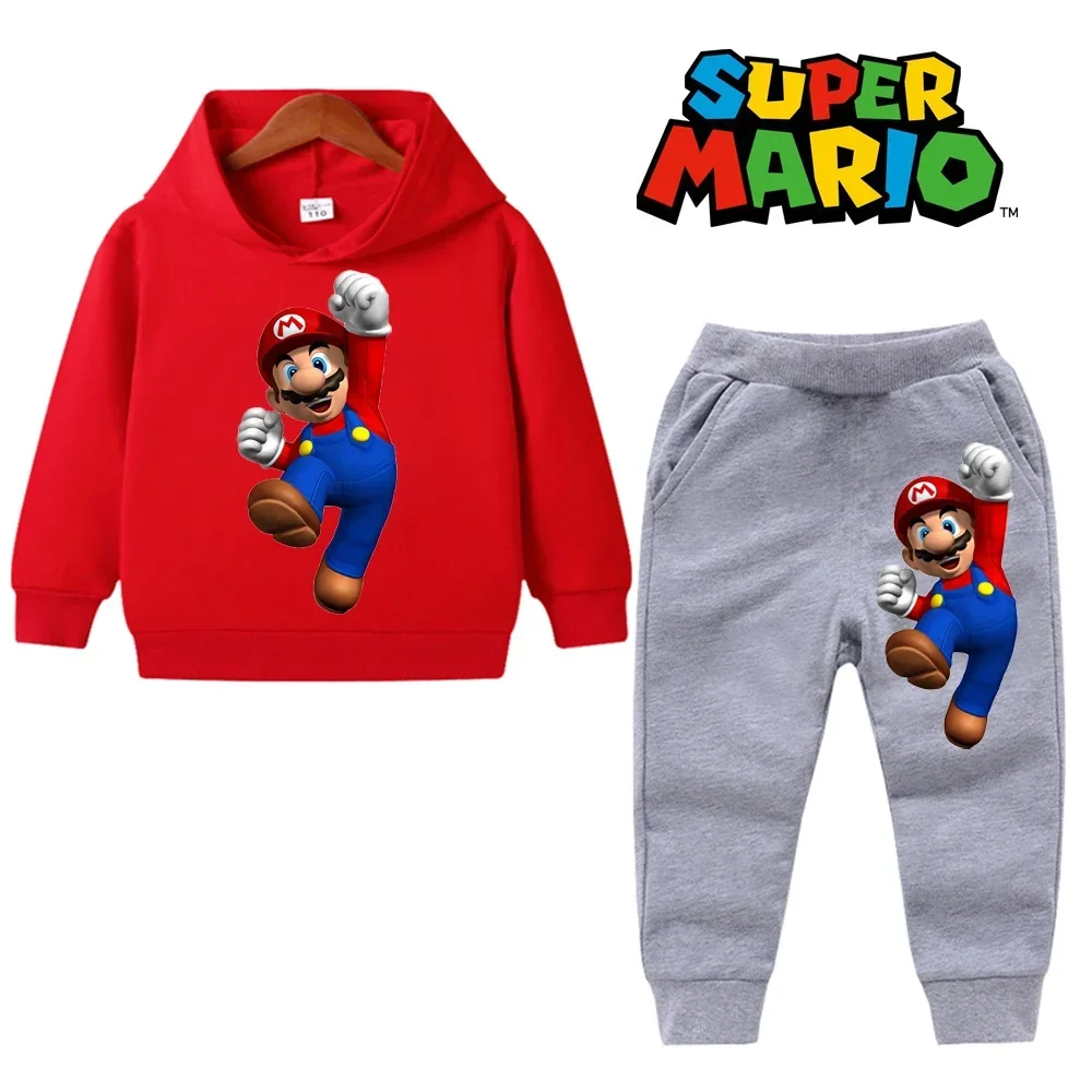 Child wearing a Mario Bros and Pokémon-themed hoodie and matching pants, smiling outdoors in a playful spring setting red gray