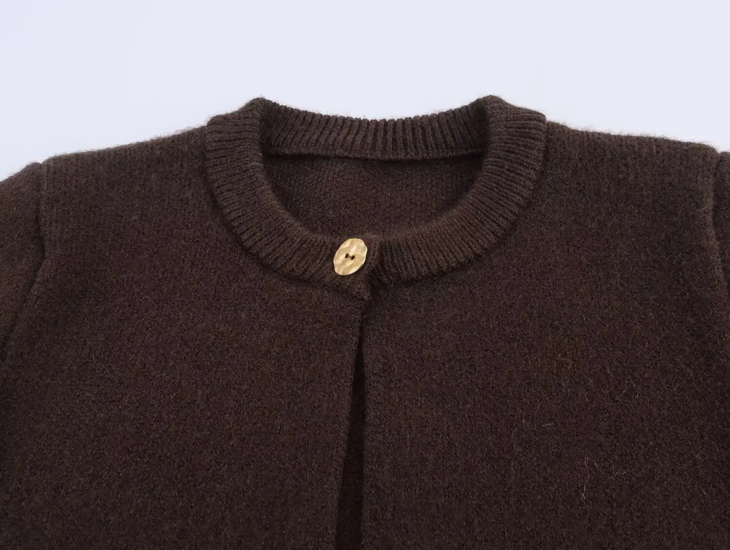 Autumn And Winter Women'S Knitted Cardigan Retro Solid Color Hem Tassel Design Coat Women'S O-Neck Single Button Knitted Sweater