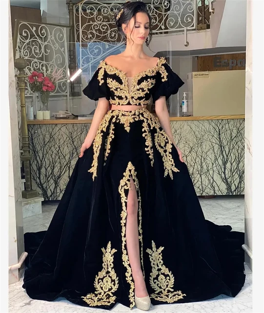 The Black gown features a gold printed pattern, which adds a touch of  traditional artistry to