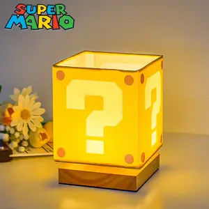 Lámpara de Super Mario Bros en forma de cubo para los adictos a Mario