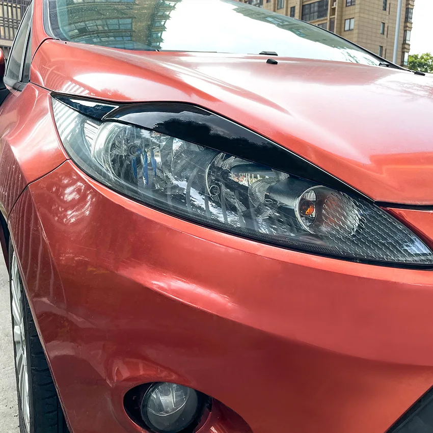 2008 To 2012 For Ford Fiesta MK6 ABS Gloss Black Carbon Fiber Look Front Headlight Eyebrow Eyelids headlight lamp cover headlight eyebrows eyelid Light Stickers car sticker Lamp Cover