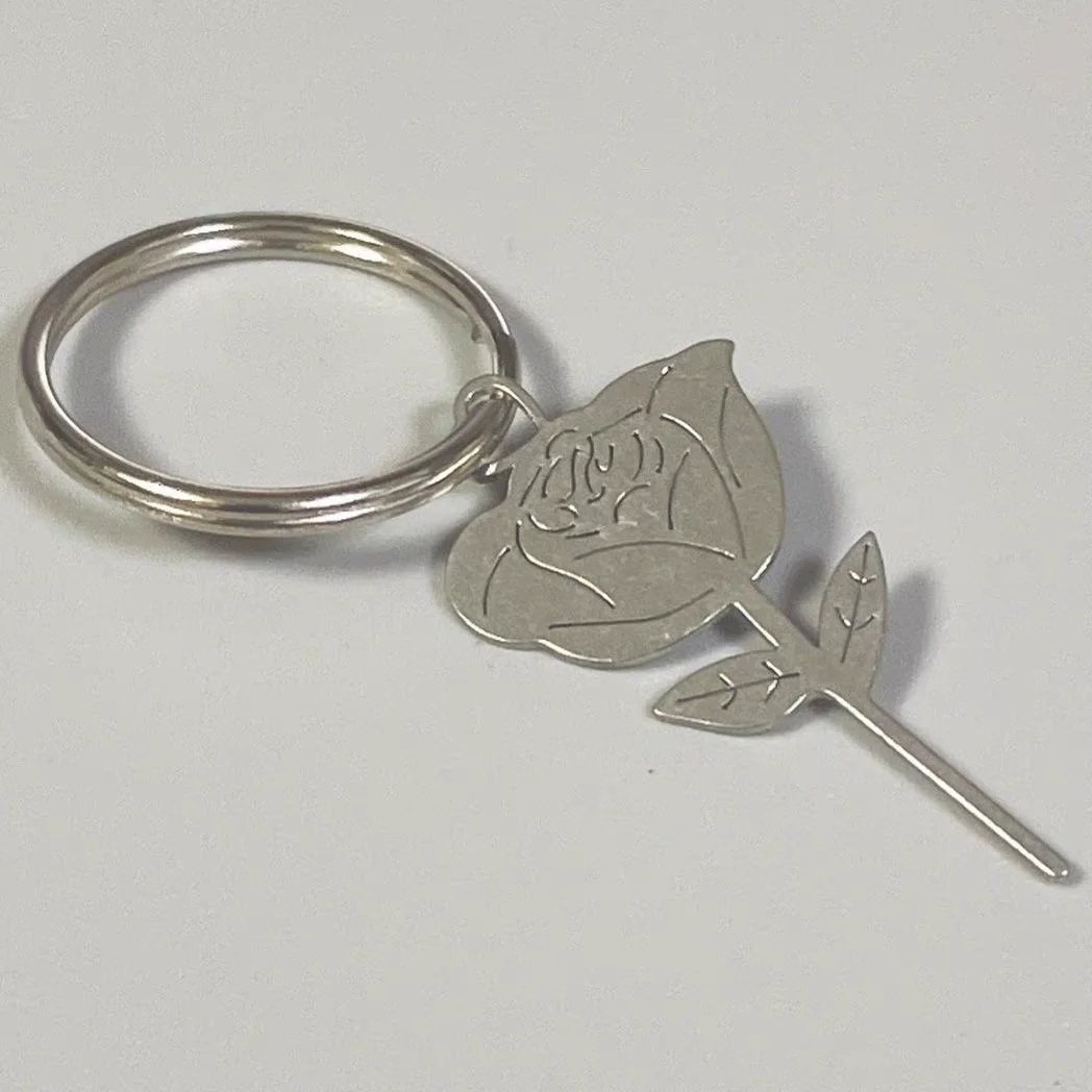 【Must-Have Accessories】 Rose shaped stainless steel mobile phone retrieval needle accessory.