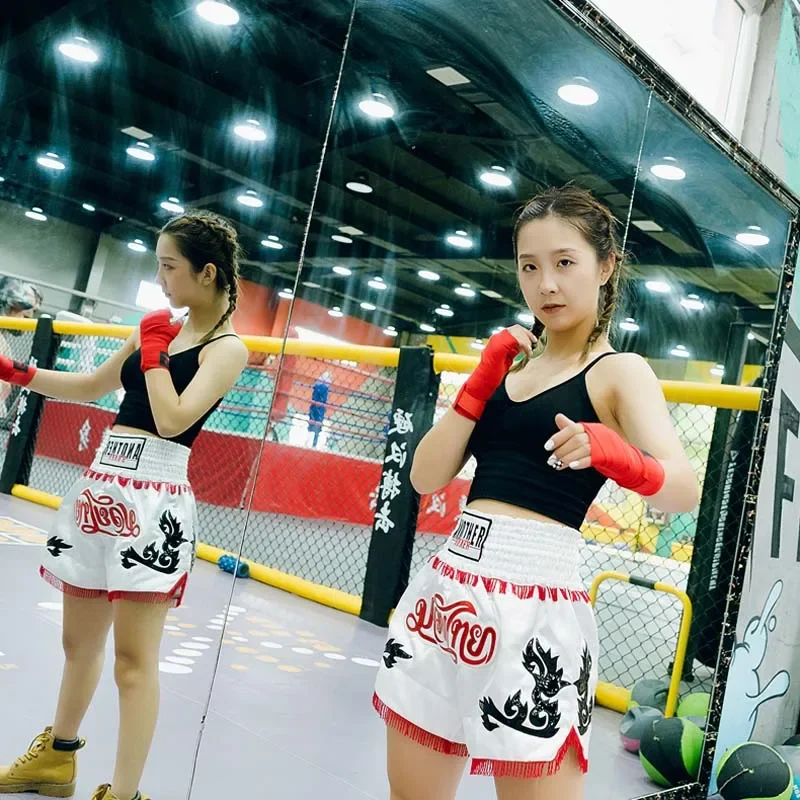 태국 복싱 반바지 소년 소녀 남성 여성 전문 싸움 태국 바지 황금 가죽 자수 패션 술 킥복싱 짧은