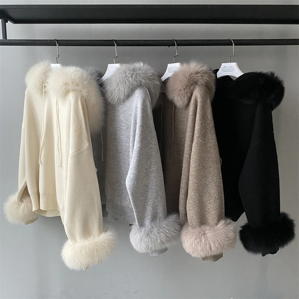 Hooded knit set with faux fur collar front pose