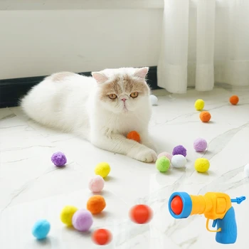 Launch-juguetes de entrenamiento para gatos, Mini juegos de pompones interactivos para gatitos, Bola de felpa elástica, suministros para gatos, accesorios, suministros para mascotas 1