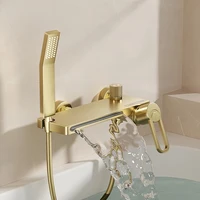 ชุดก๊อกผสมอาบน้ำแบบติดผนังสีทองขัดเงา พร้อมฝักบัวอาบน้ำทองเหลือง 3