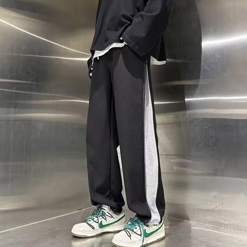 New Spring Checkered Pant Hem Zipper Split Large Size Trendy Travel Luxury Design For Men And Women With Strap Feet Casual Pants