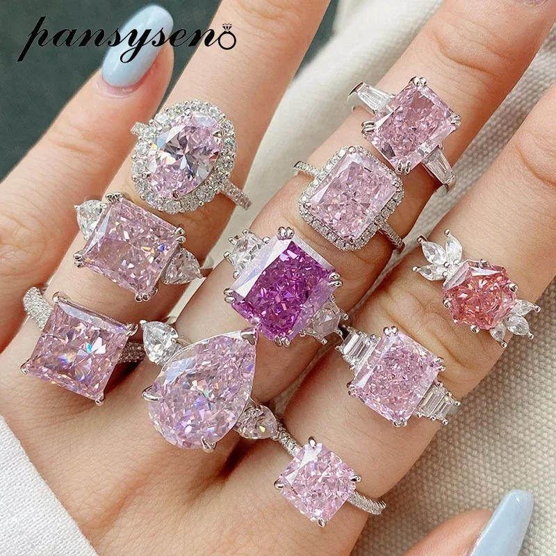 

PANSYSEN 100% 925 Sterling Silver High Carbon Diamond Pink Sapphire Gemstone Engagement Ring Wedding Band for Women Fine Jewelry