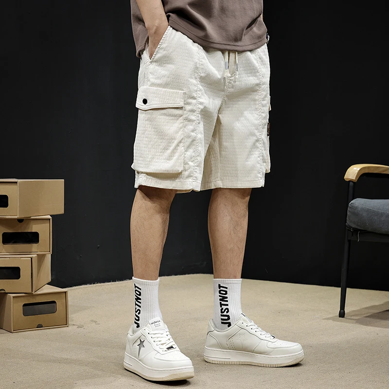 

Beige and white men's shorts sports five points casual plaid trend loose 100 big size medium pants summer new men's pants
