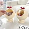 1 classic cream colored circular plastic tabletop storage box with transparent lid, suitable for living rooms and coffee tables 1