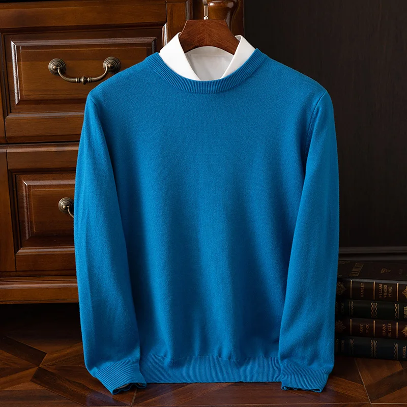 Autumn and winter pure wool men's loose O-neck pullover sweater thickened youth leisure new plus size sweater.