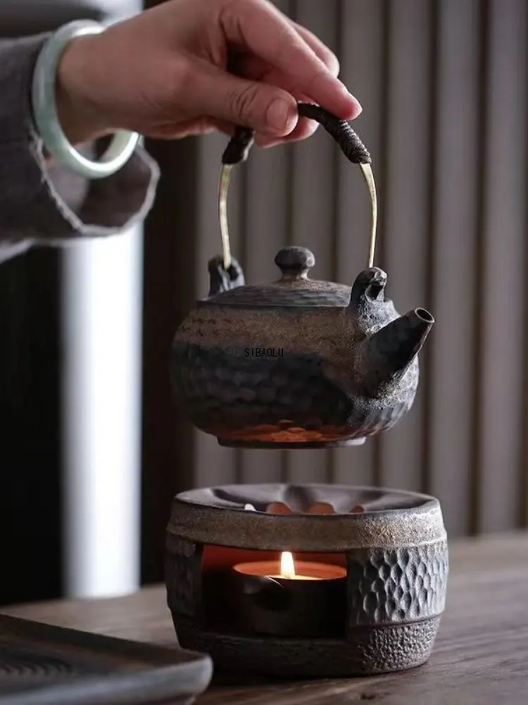 https://ae01.alicdn.com/kf/S2b7354dd1c8f405caeae78ebaeeb508aF/Japanese-Stoneware-Handmade-Teapot-Warmer-Ceramic-Retro-Tea-Warmer-Candle-Holder-Kettle-Holder-Tea-Stove-Kung.jpg
