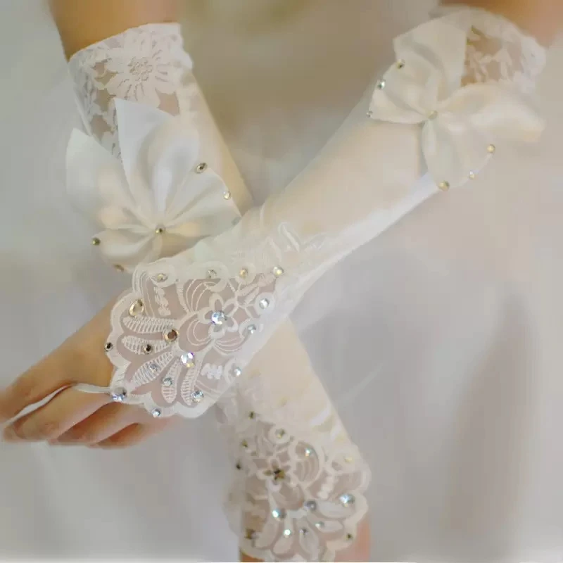 Ivory satin wedding gloves with beads and lace, finger gloves for ladies, long gloves with a bow, wedding accessories for the bride, and cheap with fast shipping.