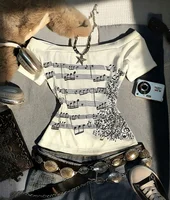 T-Shirt rétro à manches longues et épaules dénudées pour femmes, ajusté, orné d'une impression de notes musicales, à la mode, Style rétro Y2K, haute qualité 6