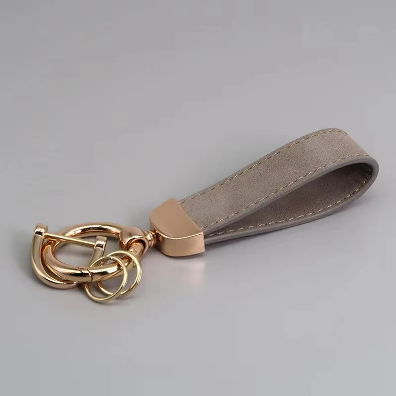 

Simple Creative Metal Backpack Pendant Leather Key chain Fashion Car Universal Key Ring Men Women Gifts Car Accessories Gold