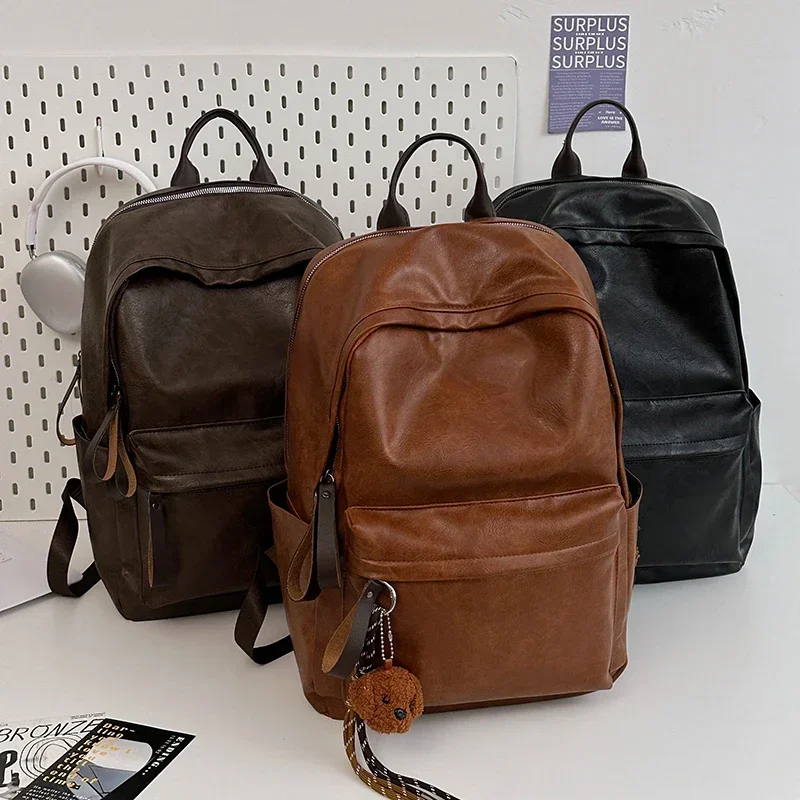 Zaini solidi in PU lucido alla moda caldi Zaini scolastici semplici e versatili di grande capacità di alta qualità per unisex 2024 Vendita calda - immagine 5