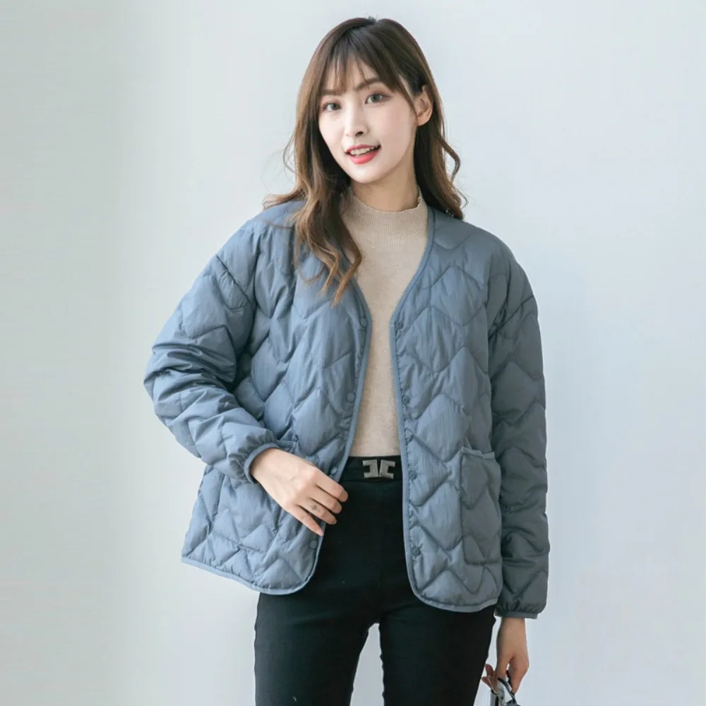 Рисунок 6 - Женский пуховик в клетку со стразами