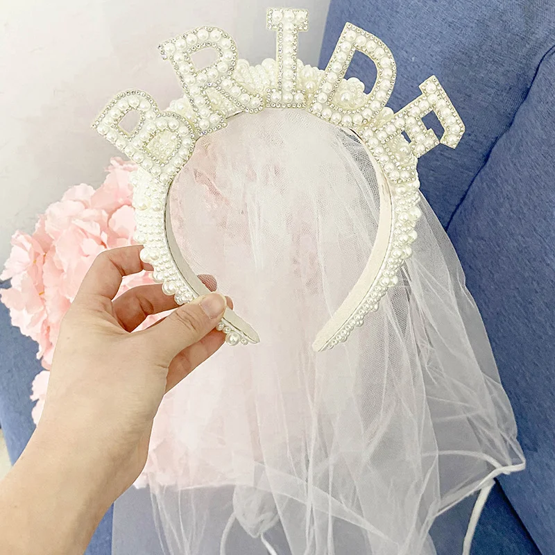 https://ae01.alicdn.com/kf/S2bb2a668bf344c1f9f2f7c9ebd7a7393E/Bride-To-Be-Pearl-Crown-Tiara-Veil-Bach-Bachelorette-Girl-Party-Wedding-Engagement-Rehearsal-Dinner-Valentine.jpg