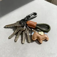 Porte-clés de voiture en cuir véritable, minimaliste, avec sangle Premium, Durable, pour hommes et femmes, cadeau de Couple, 1 pièce 5