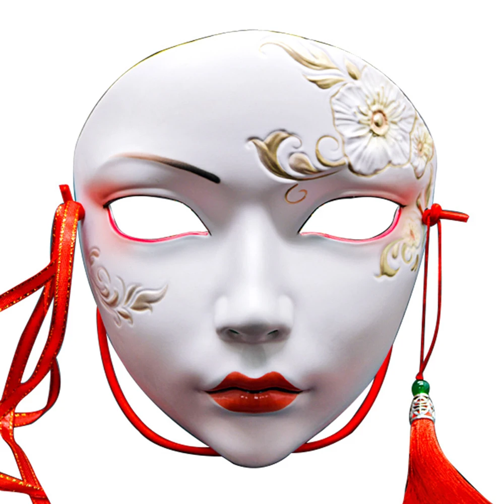 Demi masque filtrant rouge avec cartouche respiratoire posé à plat, détail des filtres et soupape.