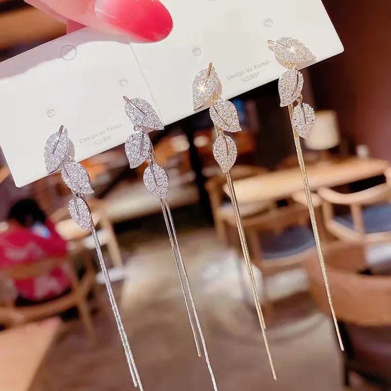 

Женские длинные серьги-кисточки, серебро 925 пробы, с листьями