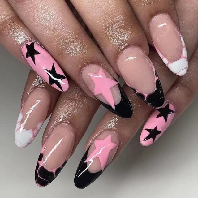 The 2023 New Y2K Press on Nails Charms in almond pink, black, and green are the perfect way to add a touch of nostalgia to your nail game. With sleek almond shapes and bold, vibrant colors, these nails are sure to make a statement and elevate any look.