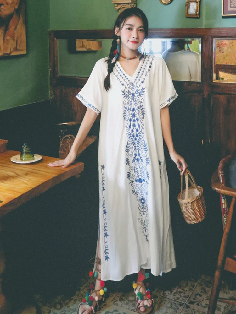 

Summer new women's retro national style heavy industry embroidered V-neck loose white long dress Bohemian travel beach dress