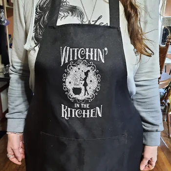 Witchin’ in The Kitchen Halloween Apron Spooky Season Home Kitchen Accessory Fall Housewarming Hostess Gift Witchcraft Cauldron 1