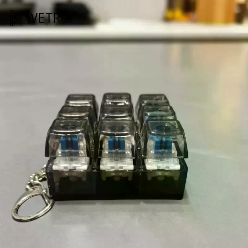 Neun-Tasten Mechanische Tastatur Keycap Fidget Toys Schlüsselanhänger Stressabbau Fingerspitzen-Gadget Entspannungs-Fidget-Spielzeug