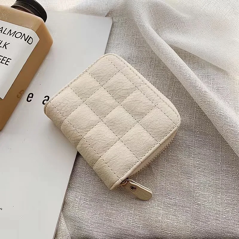 Elegant Women's Minimalist Leather Clutch with Embroidered Design